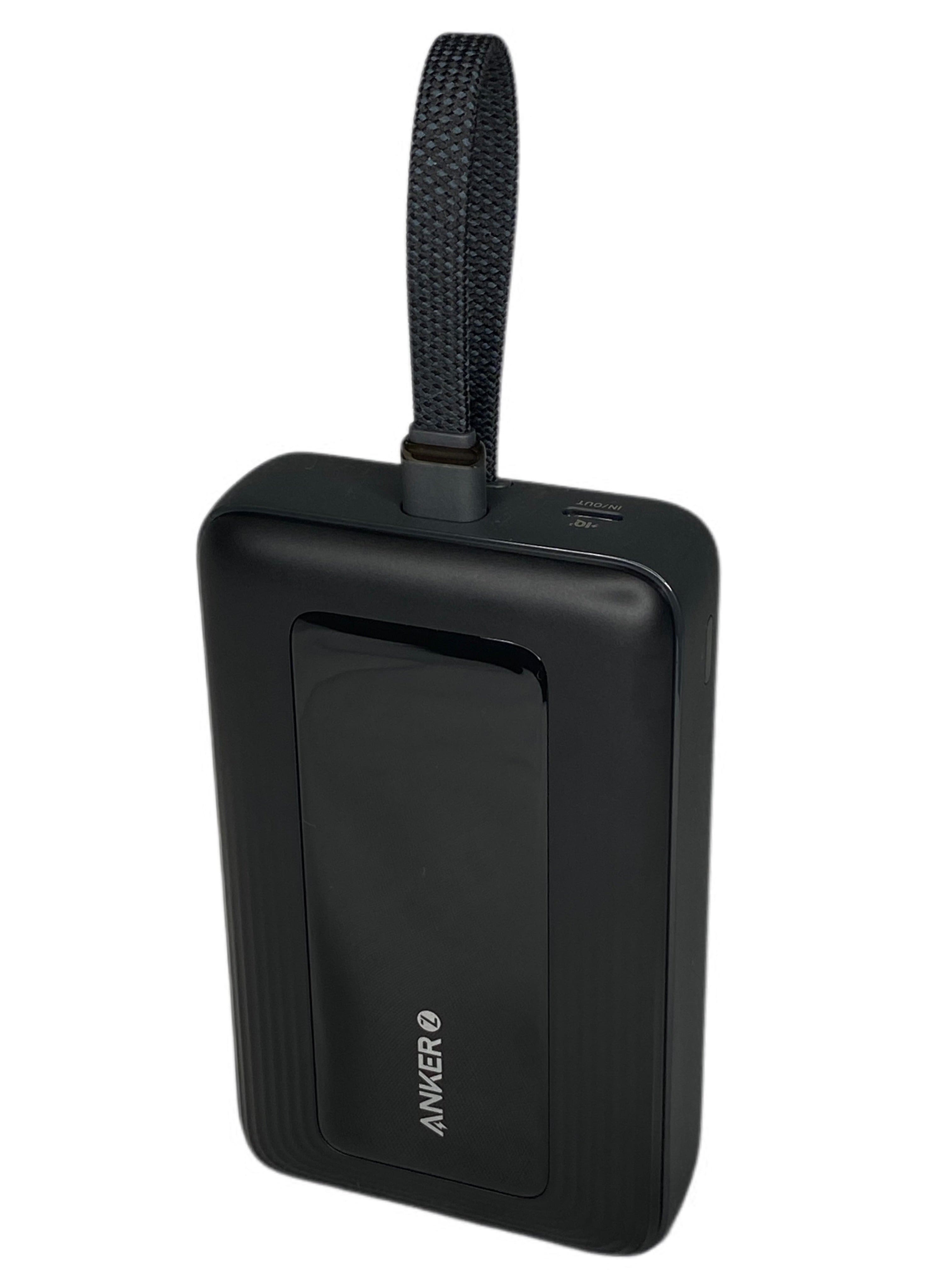 Anker power bank displaying built-in USB-C cable and compact design