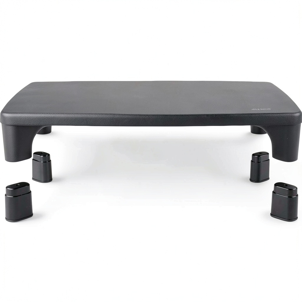 Allsop Monitor Stand on a cluttered desk showing cleared space underneath